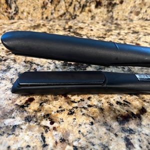 GHD Platinum + hair straightener gently used great condition.